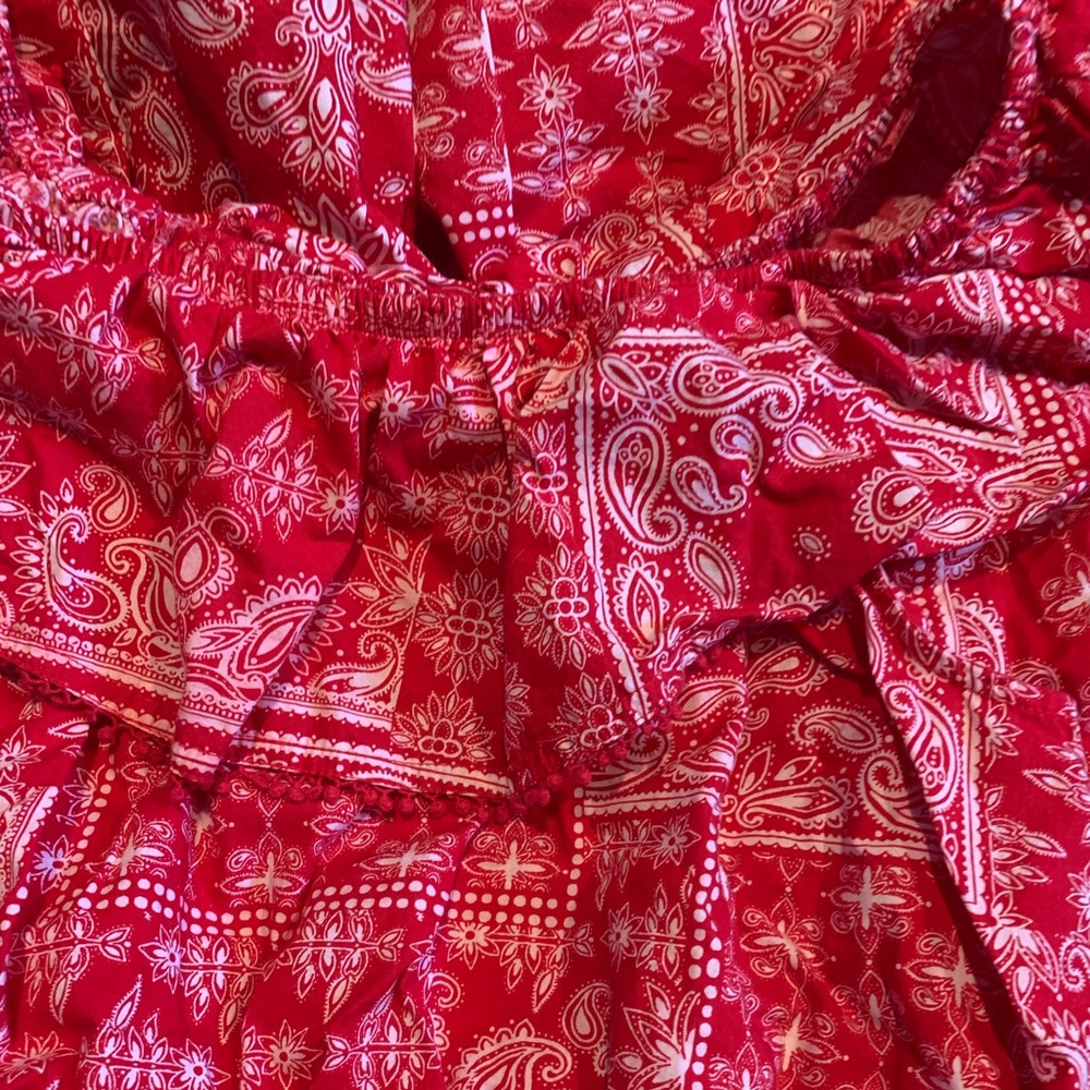 Red off the shoulder dress, medium-short.